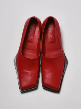 Red slashed loafers